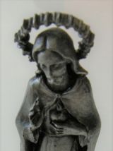Statuette jésus auréolé en étain ciselé main signé 