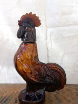 Bouteille zoomorphe en verre ambré (coq)
