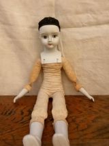 Ancienne poupée de Pierrot en céramique et en tissu 