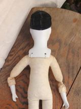 Ancienne poupée de Pierrot en céramique et en tissu 