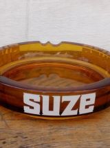 Grand cendrier publicitaire SUZE en verre ambré 