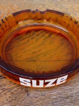 Grand cendrier publicitaire SUZE en verre ambré 
