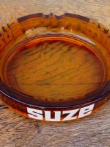 Grand cendrier publicitaire SUZE en verre ambré 