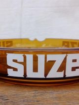 Grand cendrier publicitaire SUZE en verre ambré 