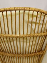 Fauteuil vintage en rotin année 60 pieds papillons.