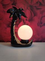 lampe palmier en céramique noire et globe opaline blanc
