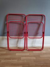 chaises pliantes rouges en métal crées par Talin en Italie