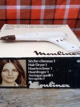 Sèche cheveux Moulinex dans sa boite d'origine 