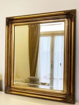 Miroir antique doré en bois