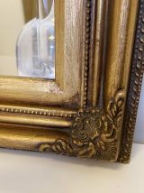 Miroir antique doré en bois