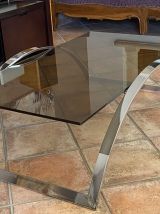 Table basse. Acier et verre fumé. 1970.