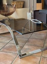 Table basse. Acier et verre fumé. 1970.