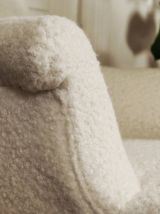 Fauteuil bergère laine bouclée