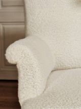 Fauteuil bergère laine bouclée
