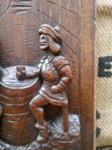 Ancien panneau en bois sculpté - Scène de taverne 