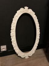 Cadre métal sculpté de miroir