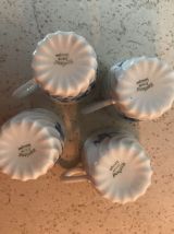 Série de 4 tasses en porcelaine de Limoges 