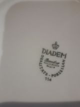 soupière  en porcelaine avec couvercle.