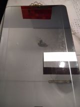 Miroir retroviseur 80cm x 38 cm laiton  et rainures , 1950’s