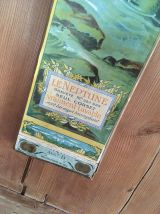 Publicité ancienne papier sur bois.