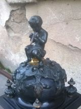 Pendule chapiteau monumentale et ses cassolette angelot