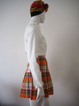 Mini jupe trapèze plissée motifs tartan  boutonnée 70's