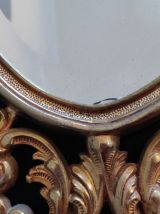 miroir rocaille en métal doré
