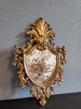 miroir rocaille en métal doré