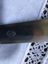 Série de 10 couteaux ERCUIS en métal argenté 