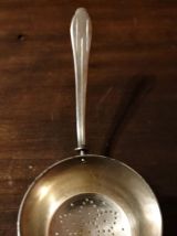 Passoire à thé en métal argenté 