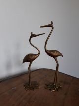 Hérons ou oiseaux échassiers en laiton