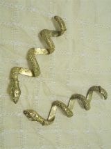Paire de serpents dorés