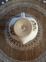 Bougeoir en céramique peinte avec anse