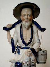Couple de pêcheurs anciennes en porcelaine fine chinoise.