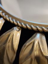 miroir soleil en métal doré