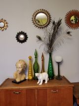 miroir soleil en métal doré