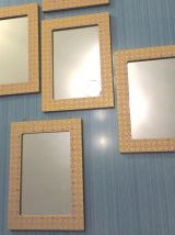 Quatre miroirs décorés