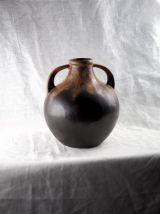Vase boule noir mat et coulures ocres / lave - G. Méténier