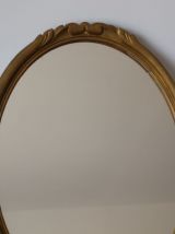 Miroir ovale en bois doré 