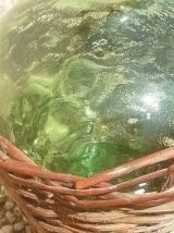 dame jeanne , bonbonne  avec osier