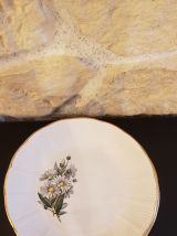 12 assiettes motifs Marguerite estampillées 1968