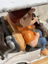 3 figurines "tire lire" humouristique