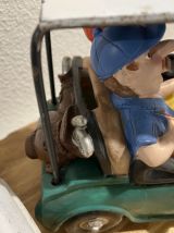 3 figurines "tire lire" humouristique