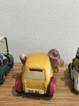 3 figurines "tire lire" humouristique