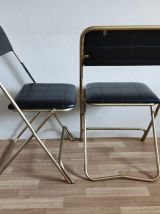 chaises pliantes noires et dorées vintage