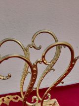 Porte-revue en laiton avec volutes - vintage 1960