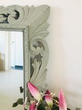 Grand miroir en bois sculpté