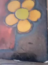 Grand decoratif Figurant un homme à la guitare. Signature à 