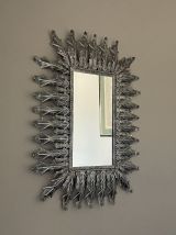 Grand miroir soleil en métal. 1960. 80x62.