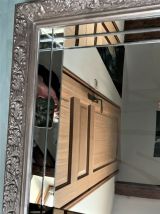 Miroir baroque argenté à parcloses intérieurs
